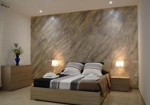 Posteľ alebo postele v izbe v ubytovaní Casa Low Cost