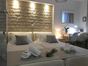 Ένα ή περισσότερα κρεβάτια σε δωμάτιο στο Central Split rooms and apartments Paese