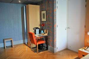 TV a/nebo společenská místnost v ubytování Amadi Park Hotel