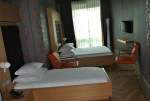 Postel nebo postele na pokoji v ubytování Amadi Park Hotel