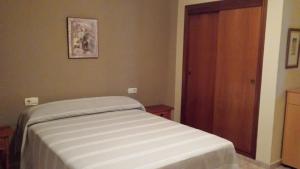 Posteľ alebo postele v izbe v ubytovaní Palmeral de Torrevieja