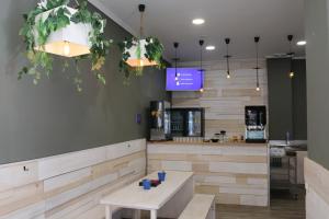 TV a/nebo společenská místnost v ubytování Hotel Alda Estación Vigo