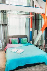 Кровать или кровати в номере Гостиница в Маяке