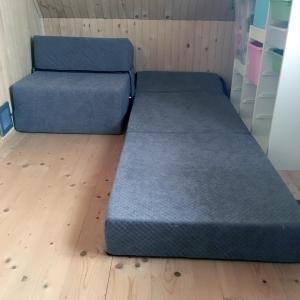 Posteľ alebo postele v izbe v ubytovaní Domek na Jagodowym Wzgórzu
