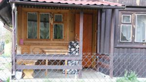 Fotografia z galérie ubytovania Domek nad jeziorem v destinácii Majdy