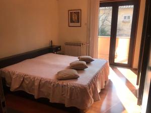 Posteľ alebo postele v izbe v ubytovaní Apartman Belle Maison