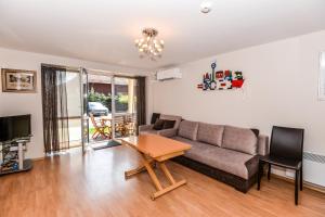 Μια τηλεόραση ή/και κέντρο ψυχαγωγίας στο Nida Lotmiskio Apartamentas