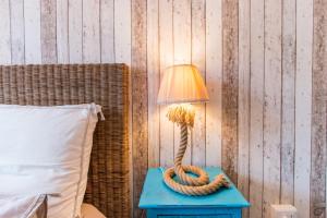 Posteľ alebo postele v izbe v ubytovaní B&B La Sosta degli Artisti