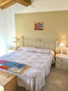 Postel nebo postele na pokoji v ubytování B&B Alloro