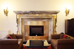 A seating area at Hotel Albergo Santa Chiara