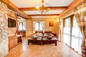 Postel nebo postele na pokoji v ubytování Solny - Resort w Bieszczadach + 37 fotografií