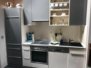 Η κουζίνα ή μικρή κουζίνα στο Apartment mit Dachloggia