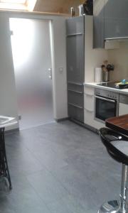 Η κουζίνα ή μικρή κουζίνα στο Apartment mit Dachloggia