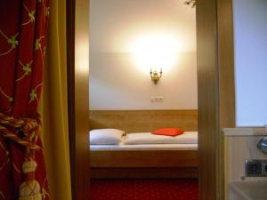 Postel nebo postele na pokoji v ubytování Pension Zeitlos