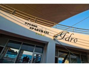 a sign on the side of a building at IDRO Studio Apartments directly at the beach in Split