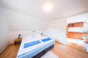 Postel nebo postele na pokoji v ubytování Penzión u Marsa