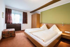 Cama o camas de una habitación en Appartements Tannenhof