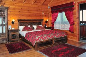 Cama o camas de una habitación en Spa Suites Bemorad Hahar
