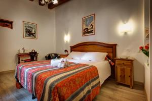 
Cama o camas de una habitación en Hotel San Samuele
