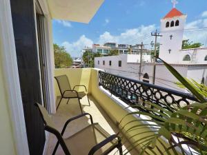 Hotel El Campanario Playa del Carmen tesisinde bir balkon veya teras