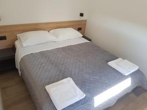 Postel nebo postele na pokoji v ubytování Casa Grzina