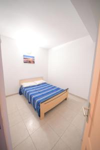 Postel nebo postele na pokoji v ubytování Residence fruit de la passion F4 + 8 fotografií