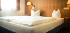Letto o letti in una camera di Hotel Servus Europa Suben