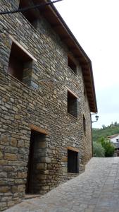 ボルターニャにあるApartamentos con Duendeの四窓の石造り