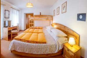 Postel nebo postele na pokoji v ubytování Il Cavallino - Albergo & Appartamenti