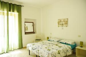 Voodi või voodid majutusasutuse B&B in Centro toas