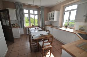 Kuchyň nebo kuchyňský kout v ubytování B&B Le Verger du Pierroy