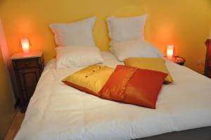 Postel nebo postele na pokoji v ubytování B&B Le Verger du Pierroy