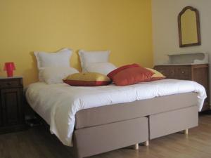 Postel nebo postele na pokoji v ubytování B&B Le Verger du Pierroy