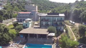 an aerial view of a resort with a swimming pool at Arabela Apartments in Utjeha
