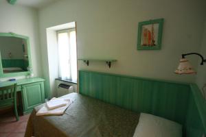 Letto o letti in una camera di Albergo Belvedere