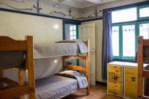 Postel nebo postele na pokoji v ubytování Hostal Forestal