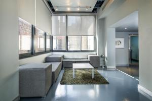 a living room with a couch and a table at Shoreham Hotel in New York