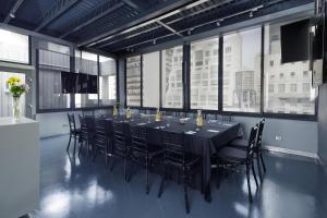 a conference room with a long table and chairs at Shoreham Hotel in New York
