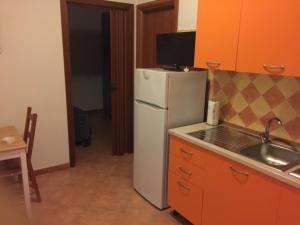 A kitchen or kitchenette at Villa Marilena