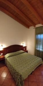 Ένα ή περισσότερα κρεβάτια σε δωμάτιο στο Hotel Barabba