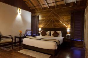 Tempat tidur dalam kamar di TSG Blue Resort & Spa