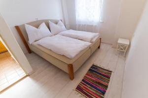 Postel nebo postele na pokoji v ubytování Villa Cihelna apartments