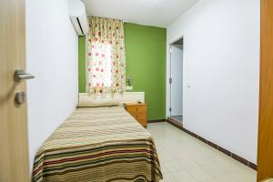Postel nebo postele na pokoji v ubytování Hotel Blason Junior