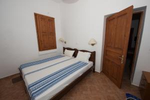 Postel nebo postele na pokoji v ubytování Villa Zeus