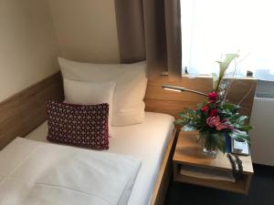 Voodi või voodid majutusasutuse Hotel Kronprinz toas