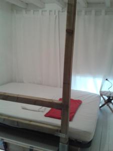 a bedroom with a bunk bed in a room at Villa Cemaste in Montpellier