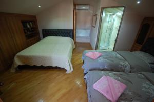 Ένα ή περισσότερα κρεβάτια σε δωμάτιο στο Guest House Eka & Gio