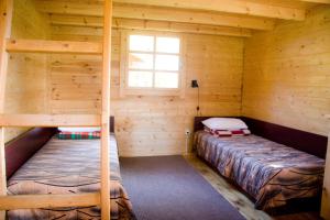 Postel nebo postele na pokoji v ubytování Camping Männisalu