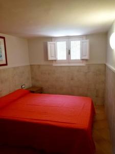 A bed or beds in a room at Casa Lorca