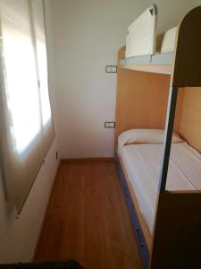 A bed or beds in a room at Casa Lorca